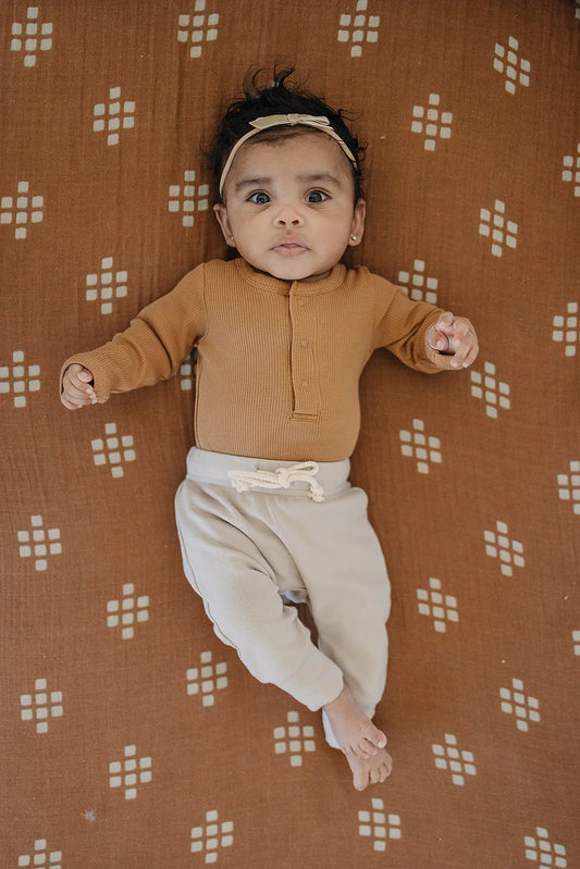 Mustard Organic Long Sleeve Ribbed Bodysuit with Snaps